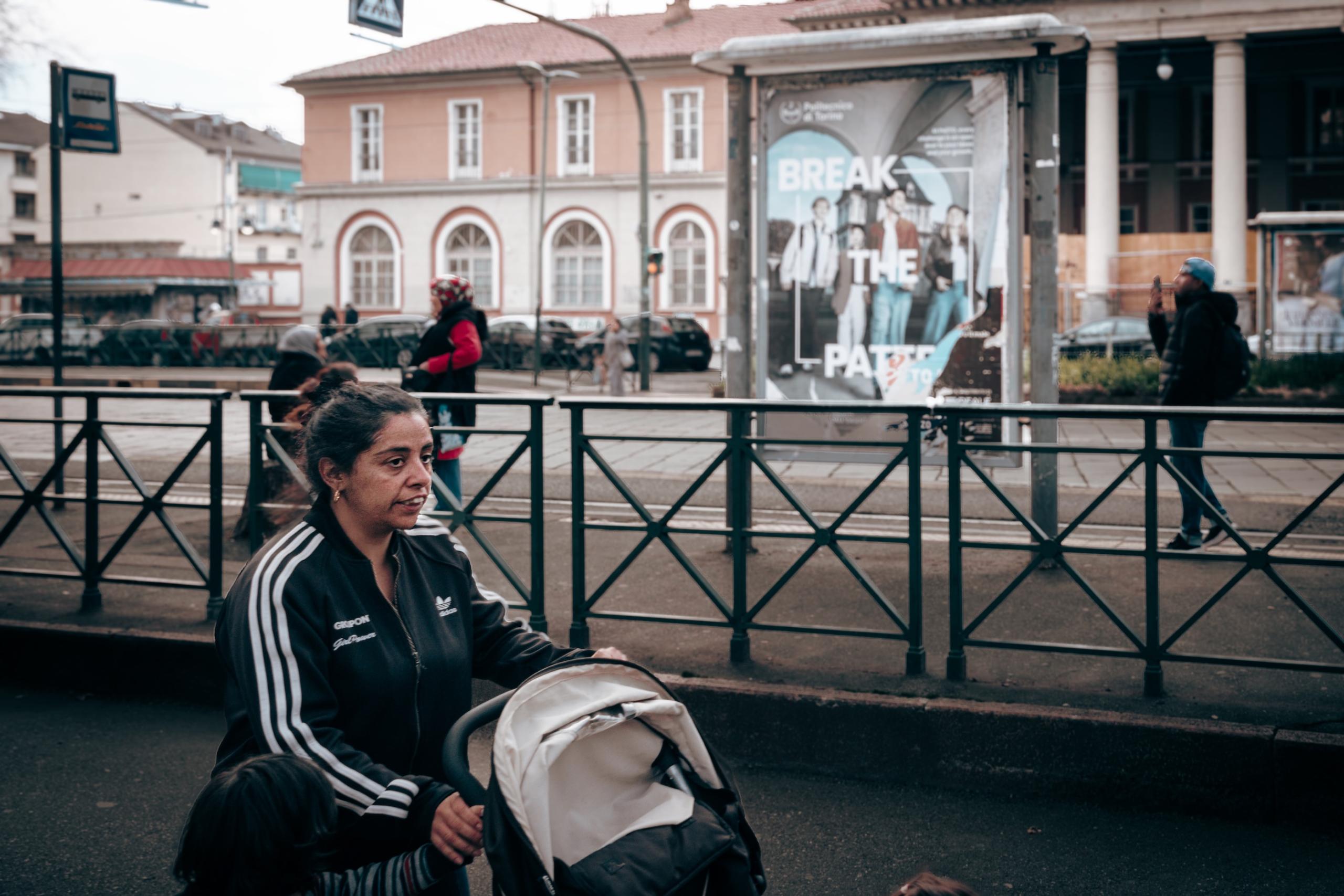 Roma mother and stroller. Corso Giulio Cesare, Torino.