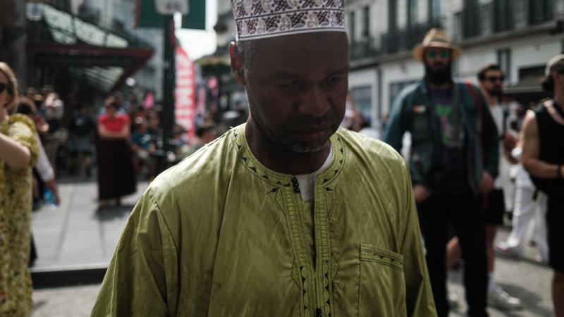 Devout Muslim. Pro-migrant procession, Brussels 1000.