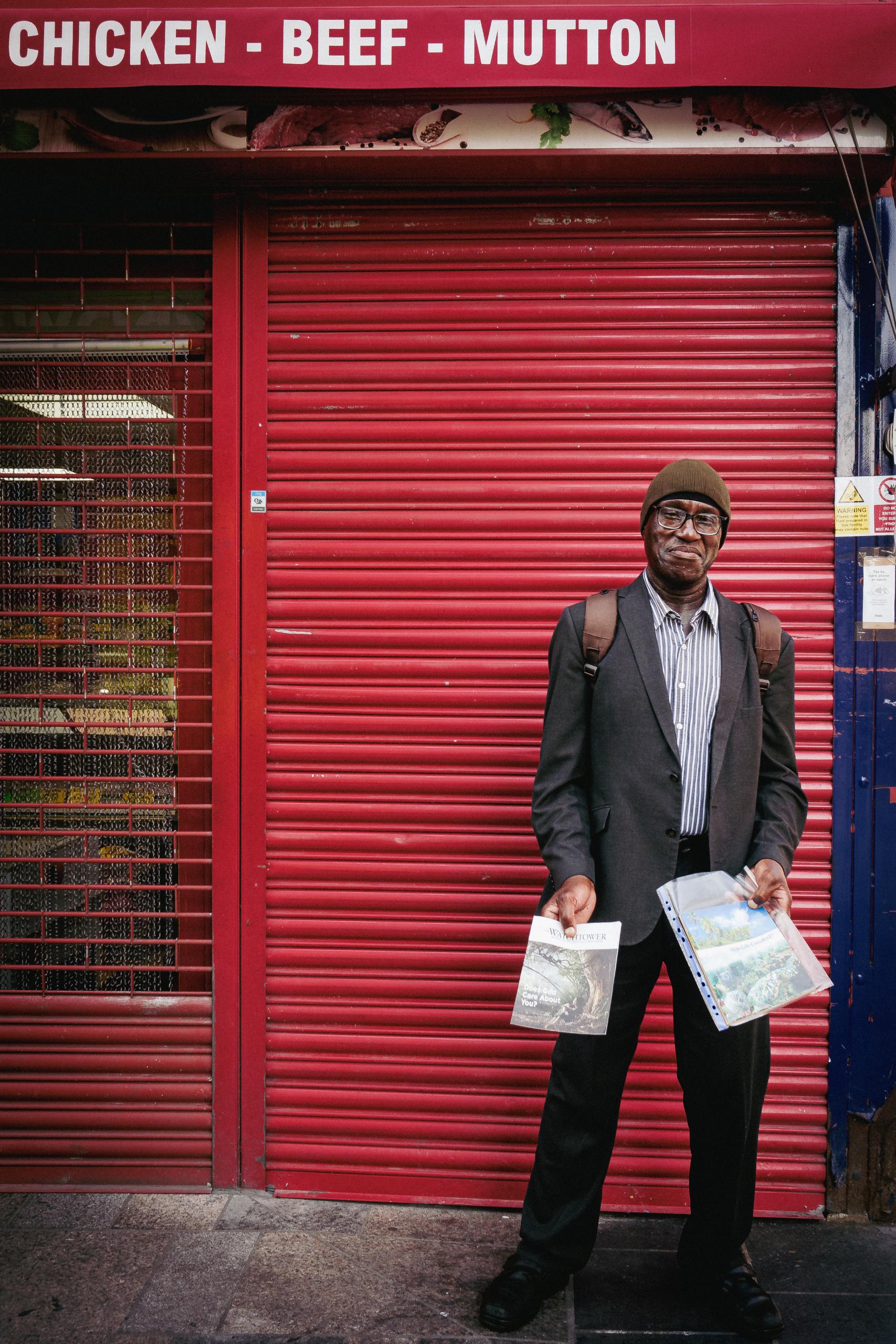 Preaching the American gospel. Jehovah's Witness missionary, Walthamstow.