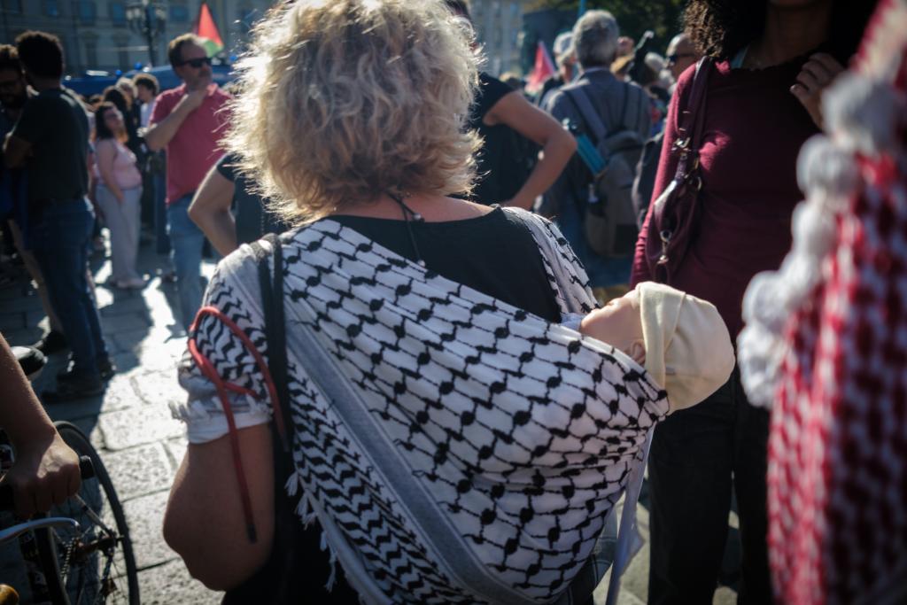 Baby in her keffiyeh. End genocide and Zionism protest, Torino.