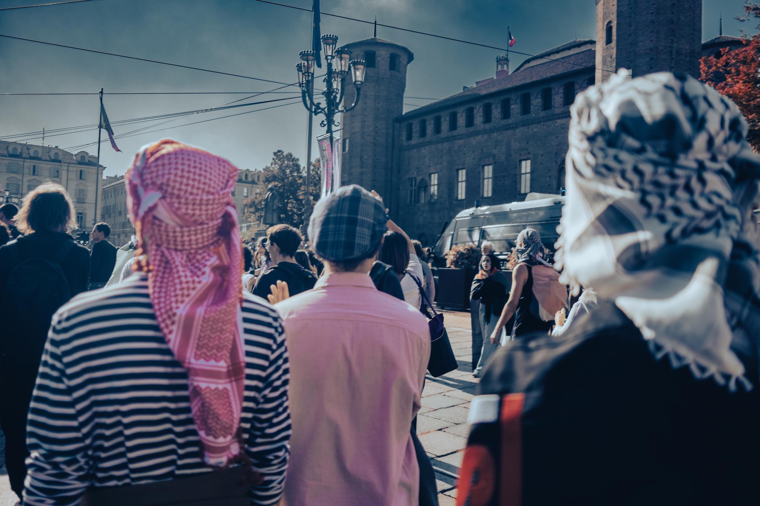 Keffiyehs in solidarity. End genocide and Zionism protest, Torino.